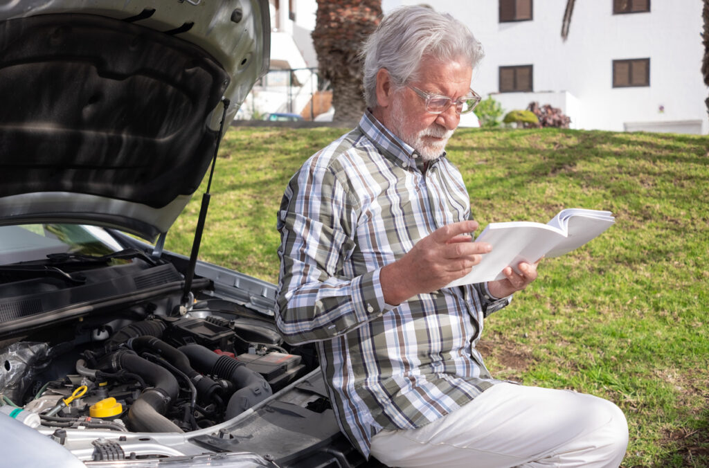 Owner looking up specific details of how to clean a gas tank